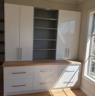 custom cabinets with wide chrome handles